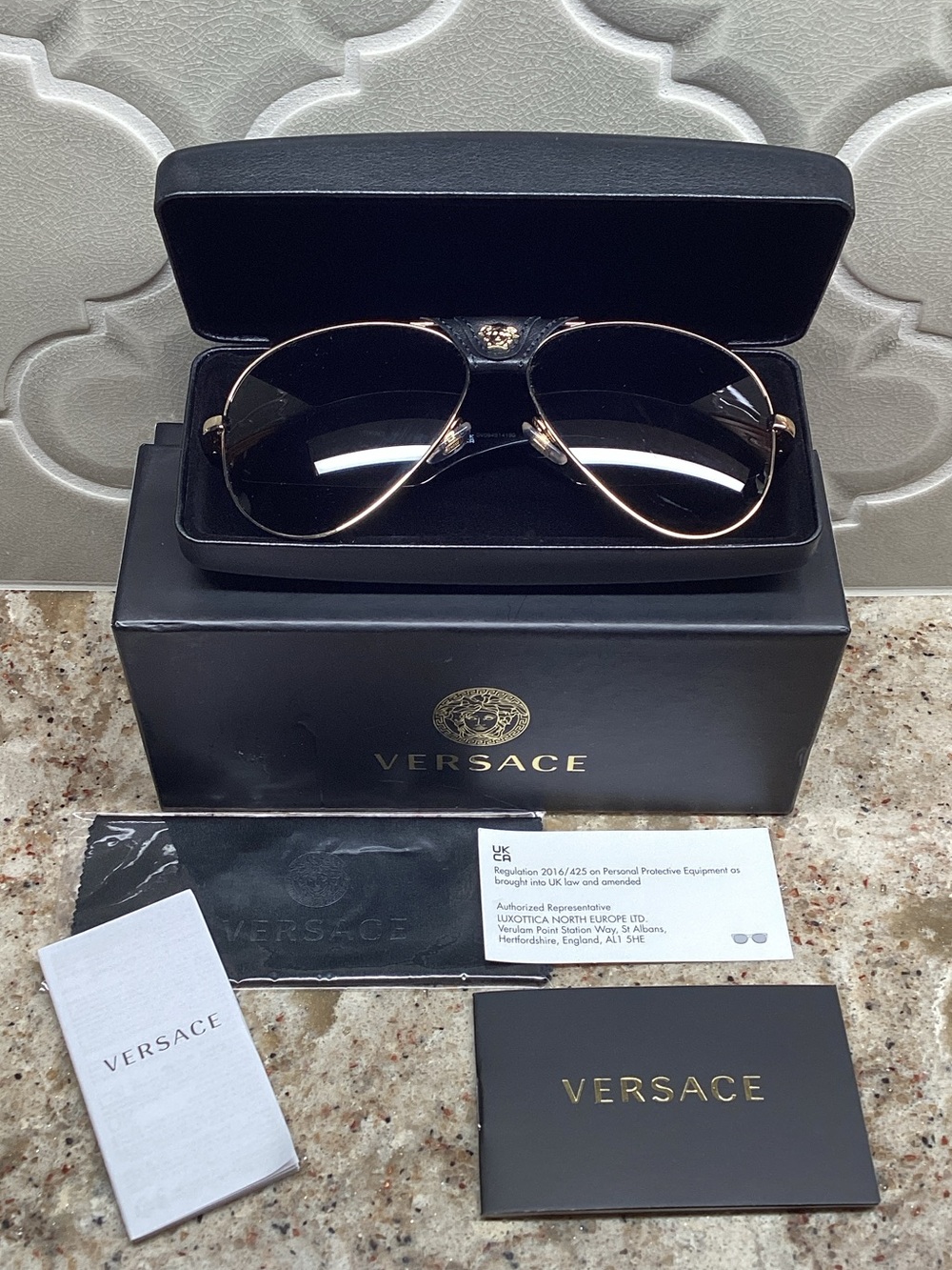 Versace Gold-Trim Aviator Sunglasses with grey lenses